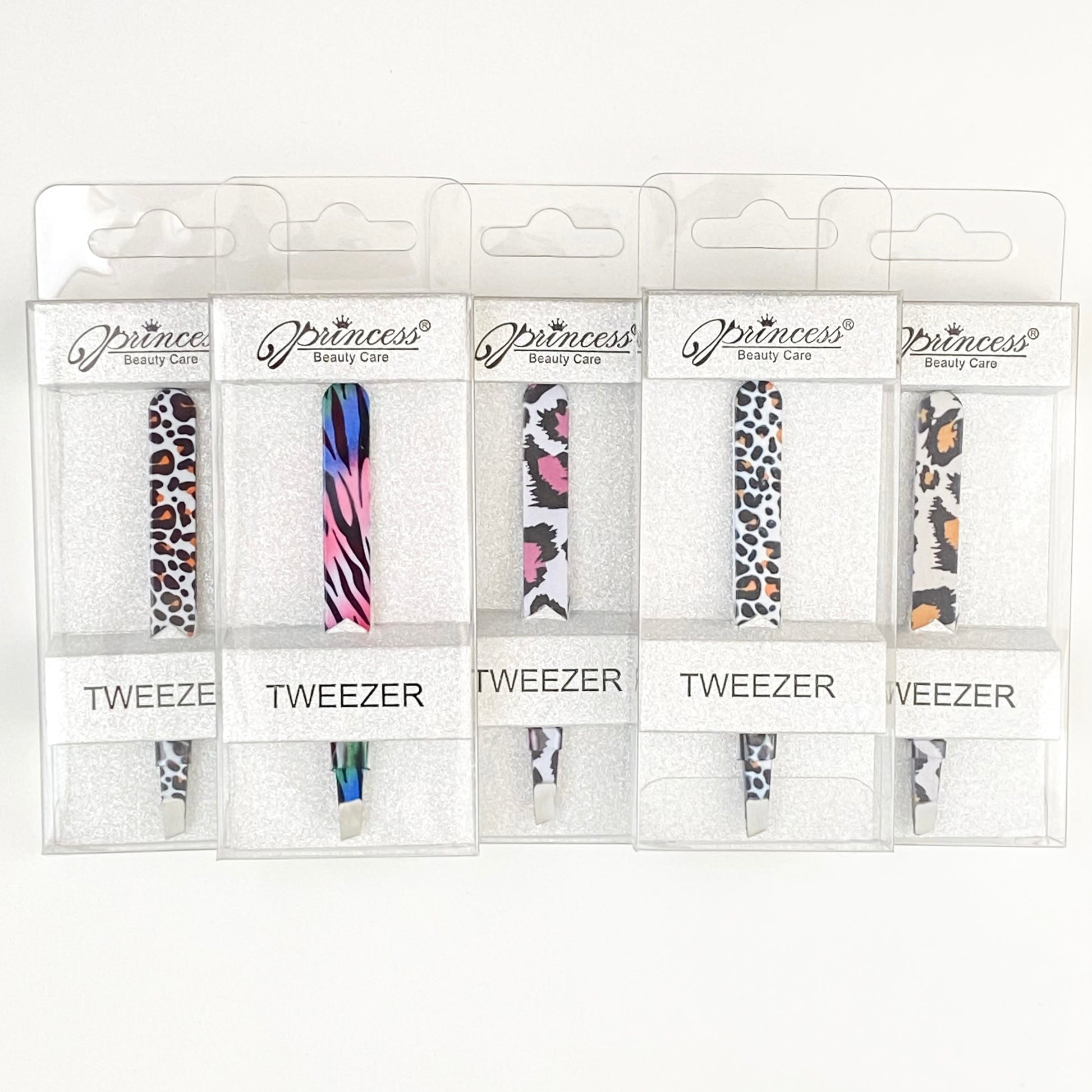 different styles of animal print tweezers in glitter packaging