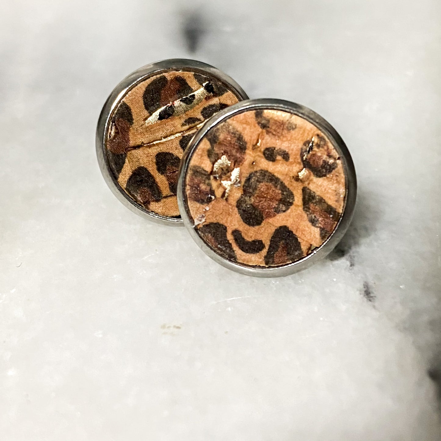 distressed tan cork with gold inlay with brown and black classic cheetah print inlay in silver bezel stud earrings