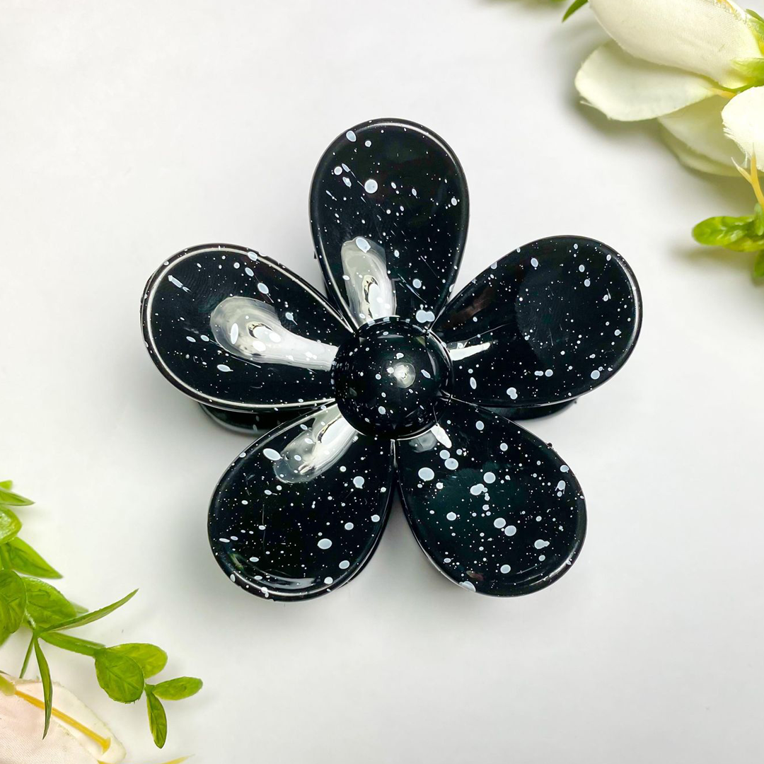 glossy white speckled black flower shaped hair claw clip